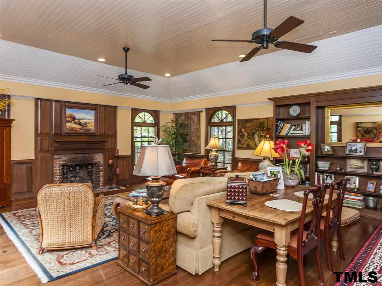 1804 Pony Run Road Raleigh, NC 27615 - Photo 6 of 25 a living room with fireplace furniture and a window