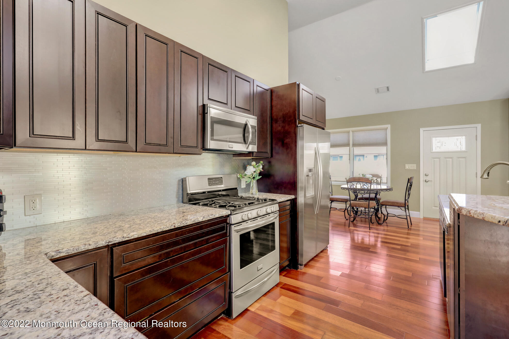 241 Timberline Road Toms River, NJ 08753 - Photo 16 of 29 a kitchen with stainless steel appliances granite countertop a stove a sink and a microwave