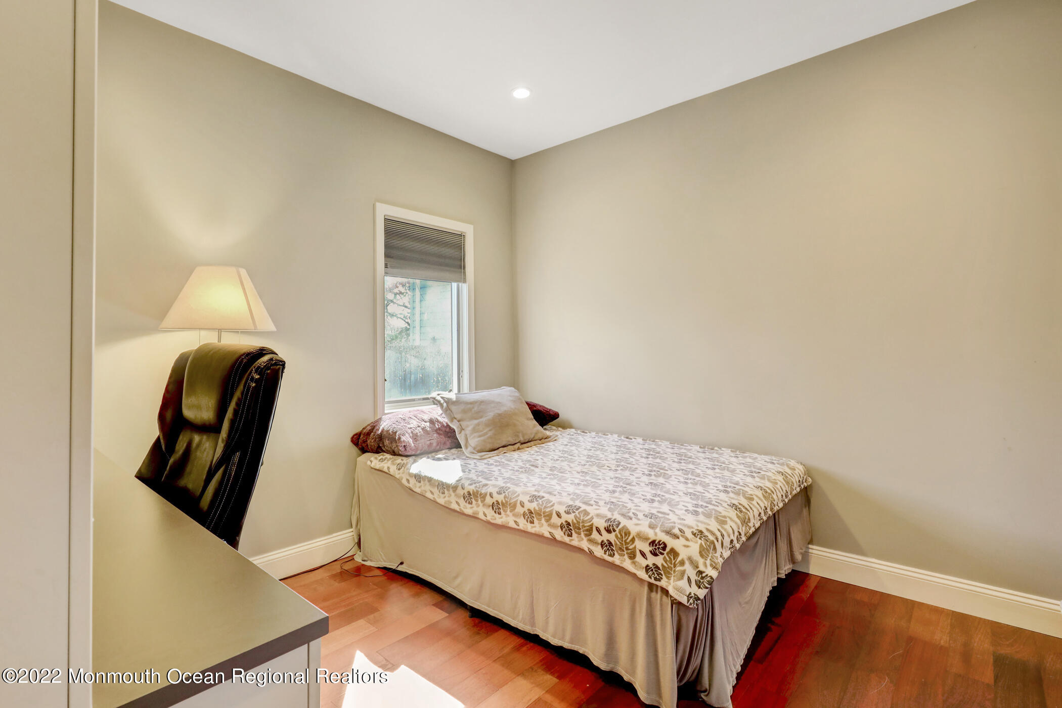 241 Timberline Road Toms River, NJ 08753 - Photo 21 of 29 a bedroom with a bed and lamp
