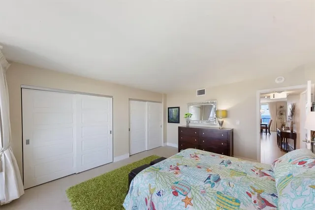 a view of a balcony with an ocean view