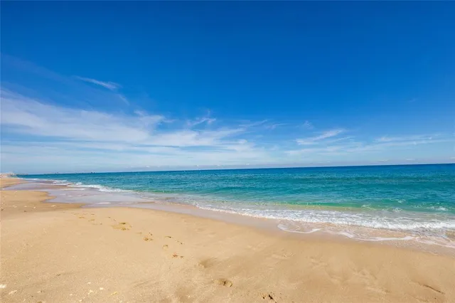 a living room filled with furniture and a couch