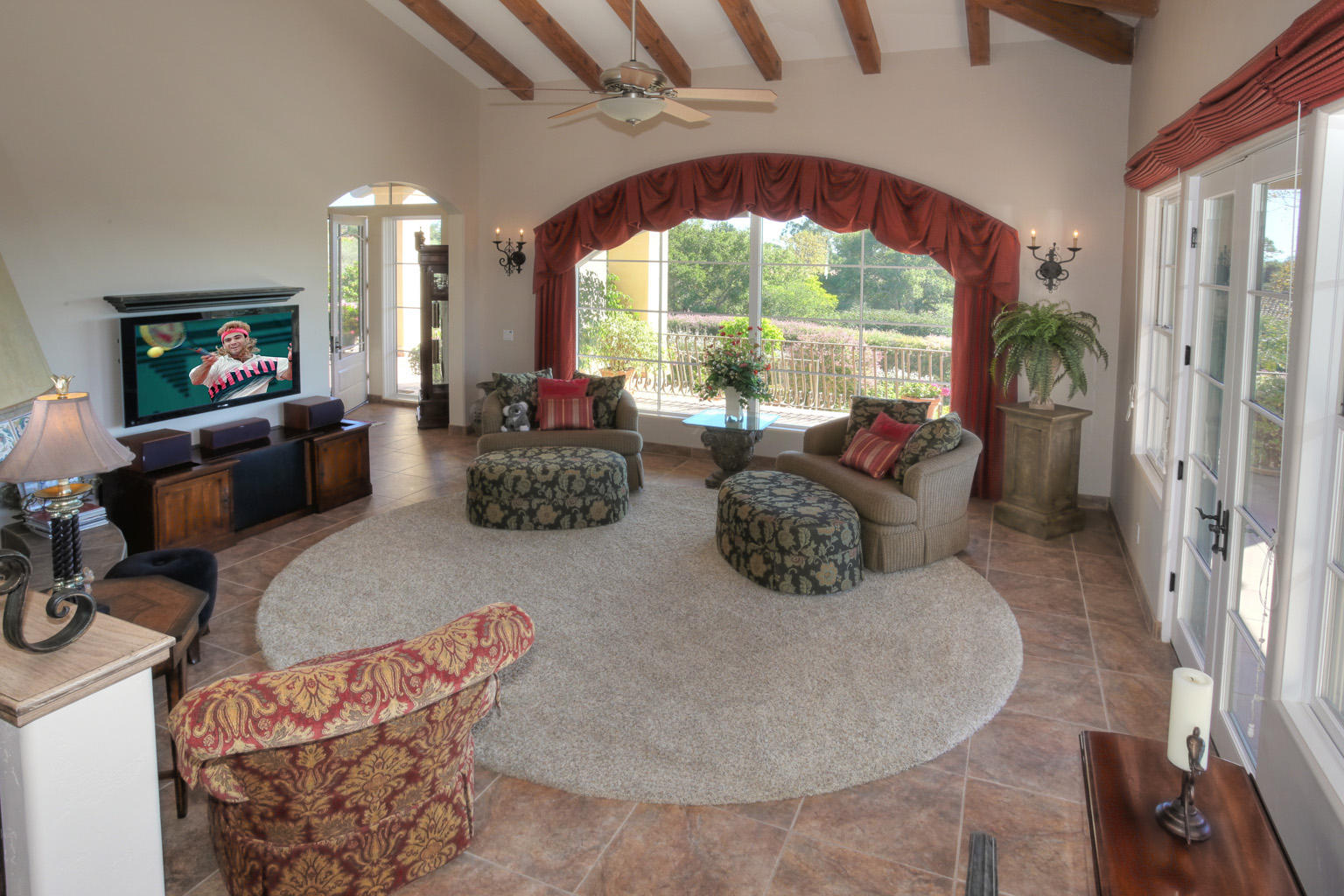 425 Ennisbrook Drive Montecito, CA 93108 - Photo 10 of 30 a living room with furniture and a flat screen tv