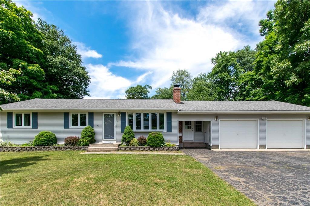 28 Carney Road Enfield, CT 06082 - Photo 1 of 1 a view of a house with a yard and plants