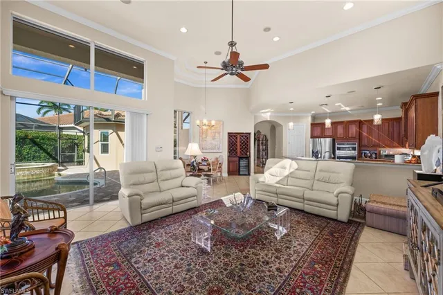 a living room with furniture wooden floor and a fireplace