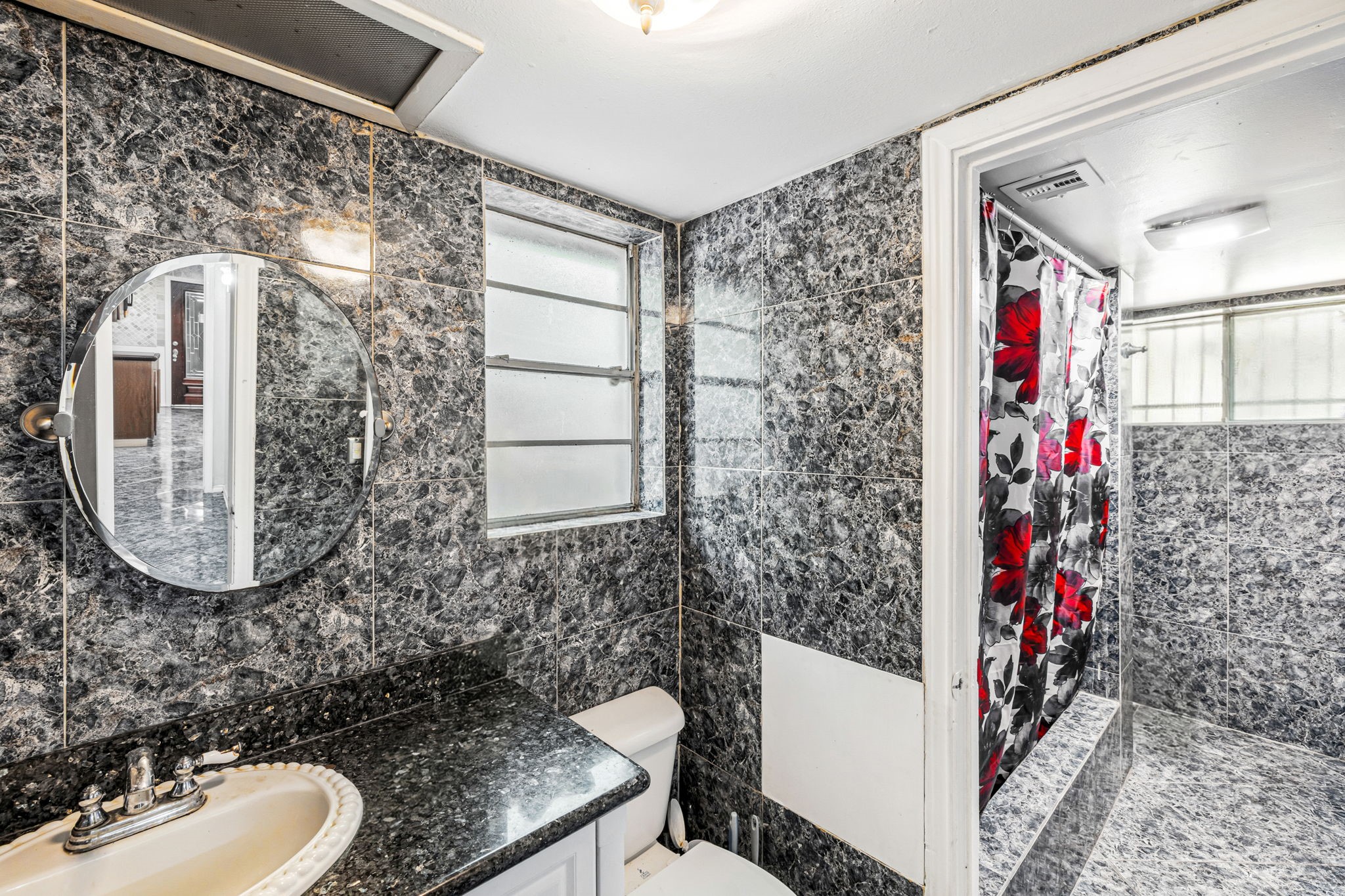 4422 Sandydale Lane Houston, TX 77039 - Photo 12 of 36 a bathroom with a sink toilet and shower