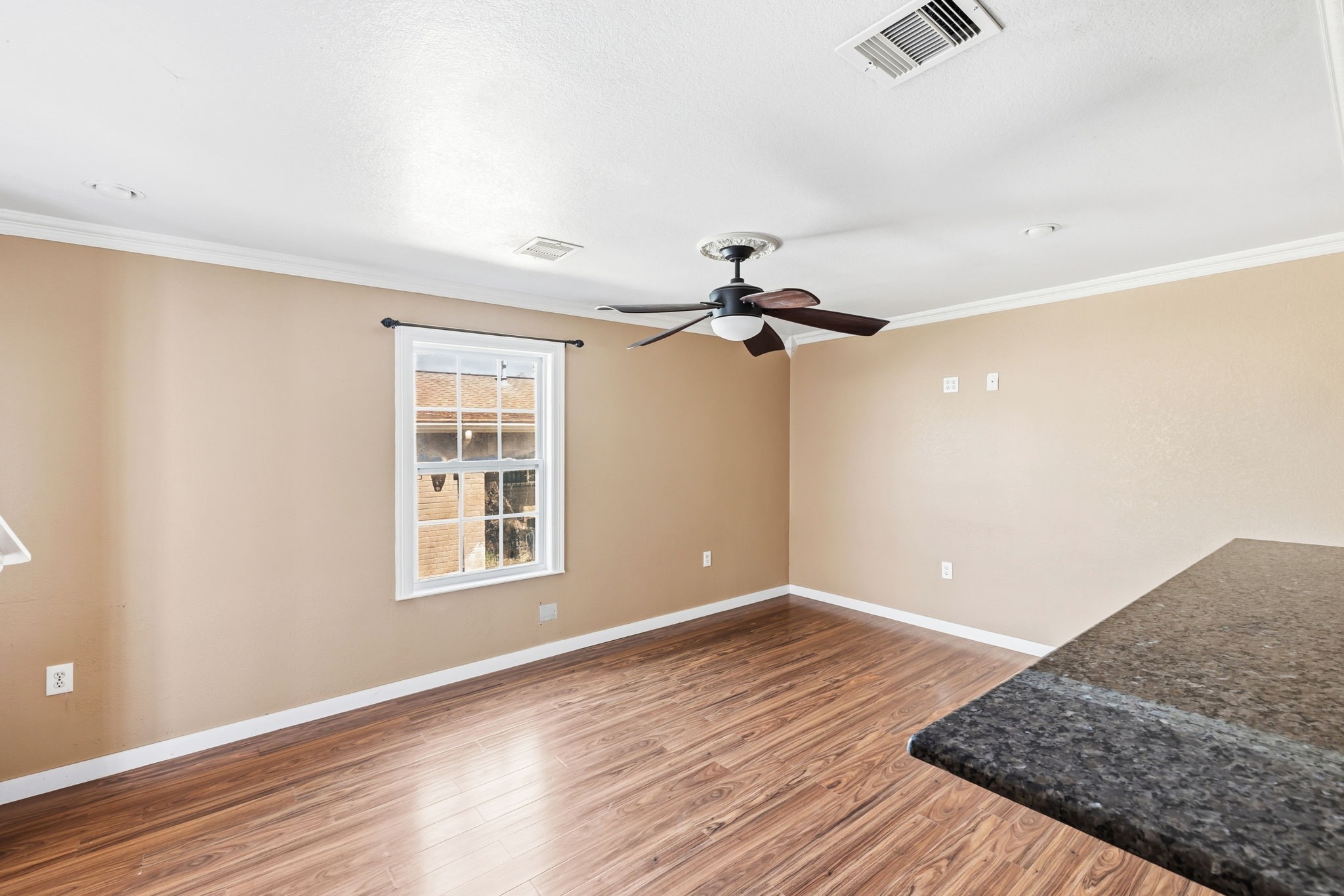4422 Sandydale Lane Houston, TX 77039 - Photo 25 of 36 wooden floor in an empty room with a window