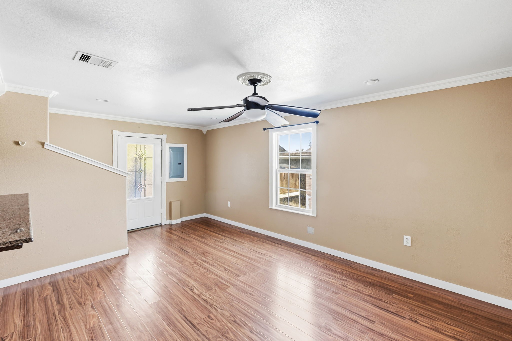 4422 Sandydale Lane Houston, TX 77039 - Photo 29 of 36 a view of empty room with wooden floor and fan