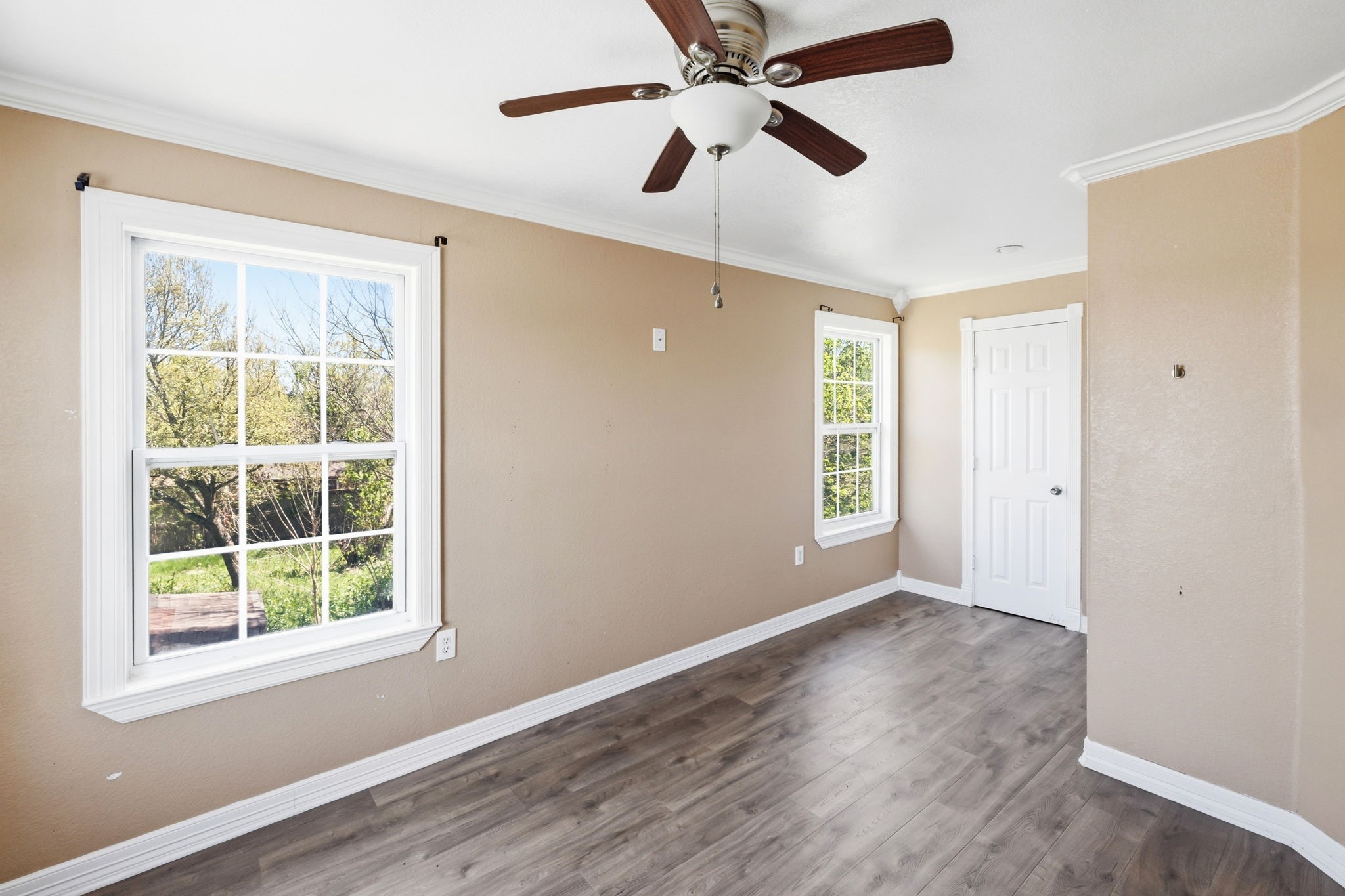 4422 Sandydale Lane Houston, TX 77039 - Photo 33 of 36 a view of an empty room with wooden floor and a window
