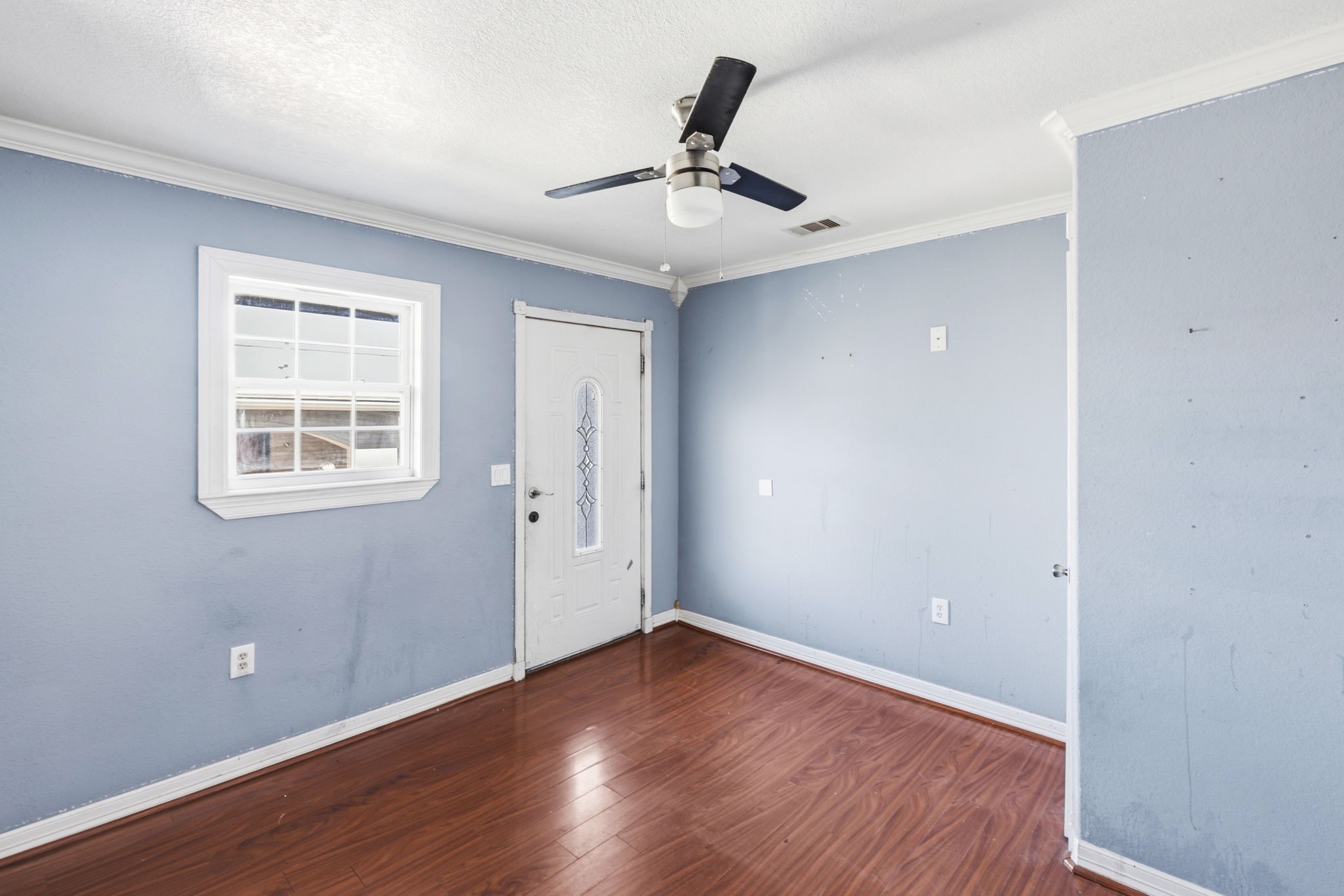 4422 Sandydale Lane Houston, TX 77039 - Photo 35 of 36 wooden floor in an empty room with a window