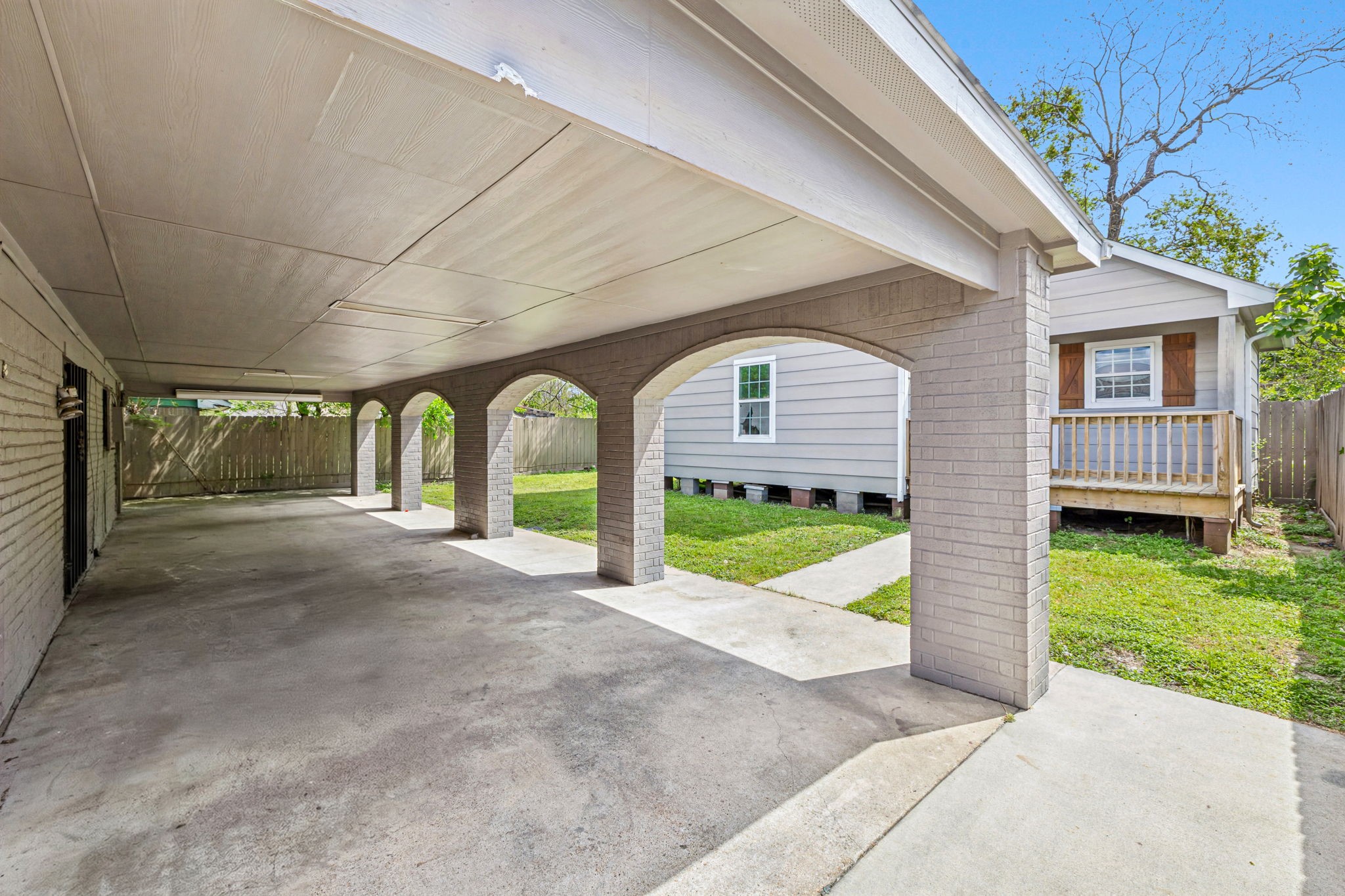 4422 Sandydale Lane Houston, TX 77039 - Photo 5 of 36 a view of a house with a yard and potted plants