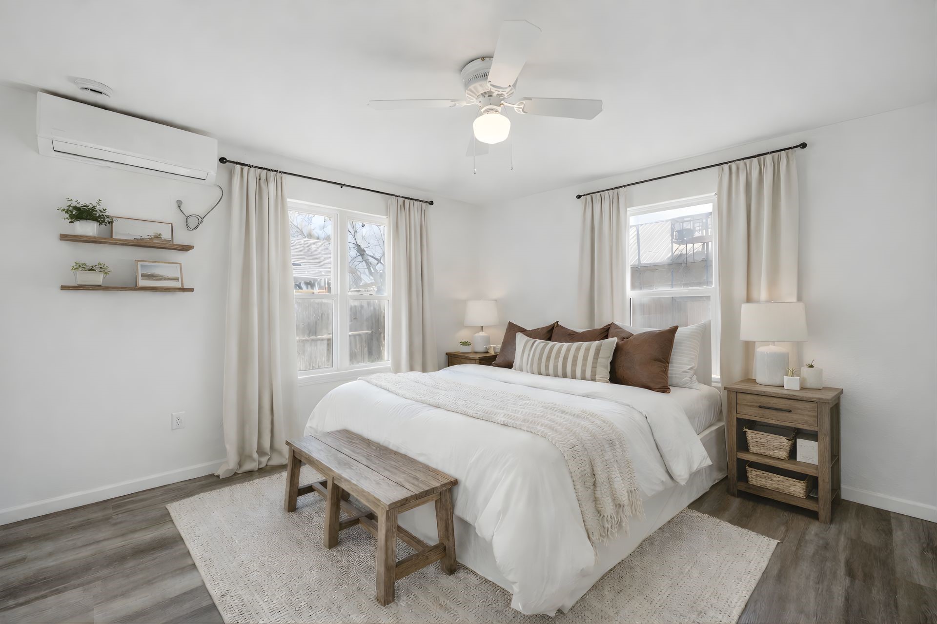 7019 Bonham Street Houston, TX 77020 - Photo 9 of 17 a bedroom with a bed and a table in it