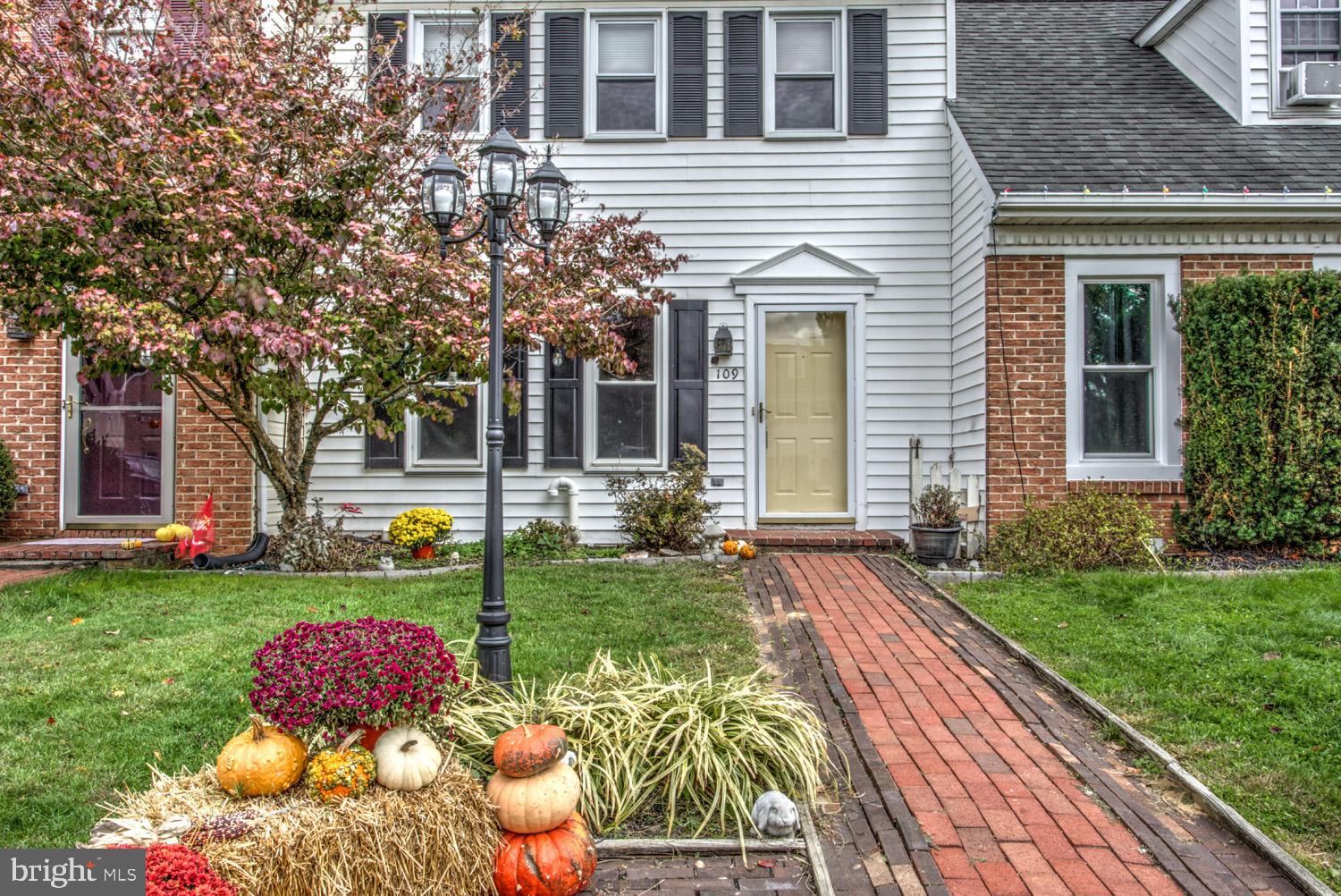 109 Chukar Court Lititz, PA 17543 - Photo 3 of 27 Brick sidewalk to main entrance