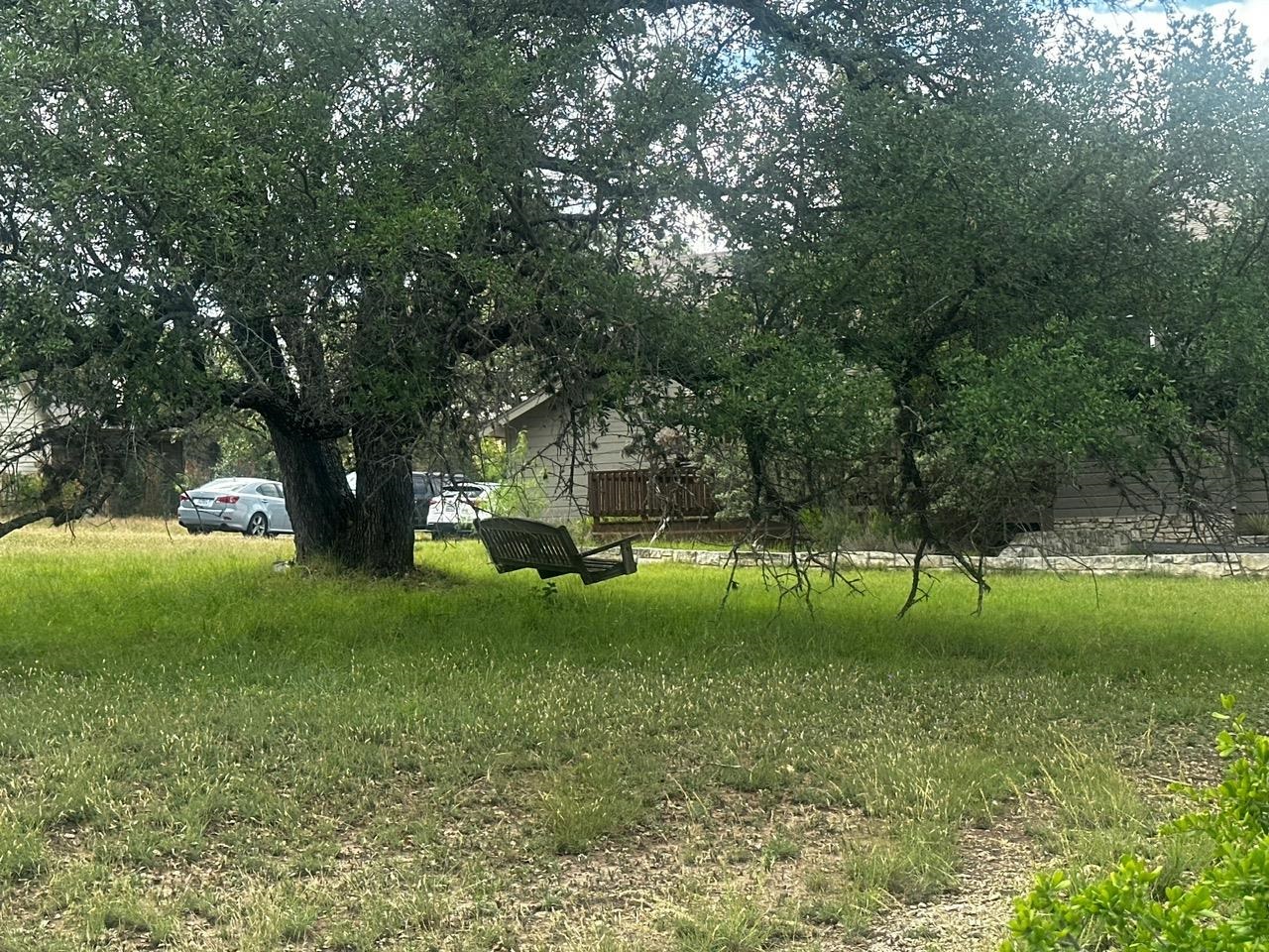 712 Coventry Road Spicewood, TX 78669 - Photo 10 of 21 a view of a park with large trees