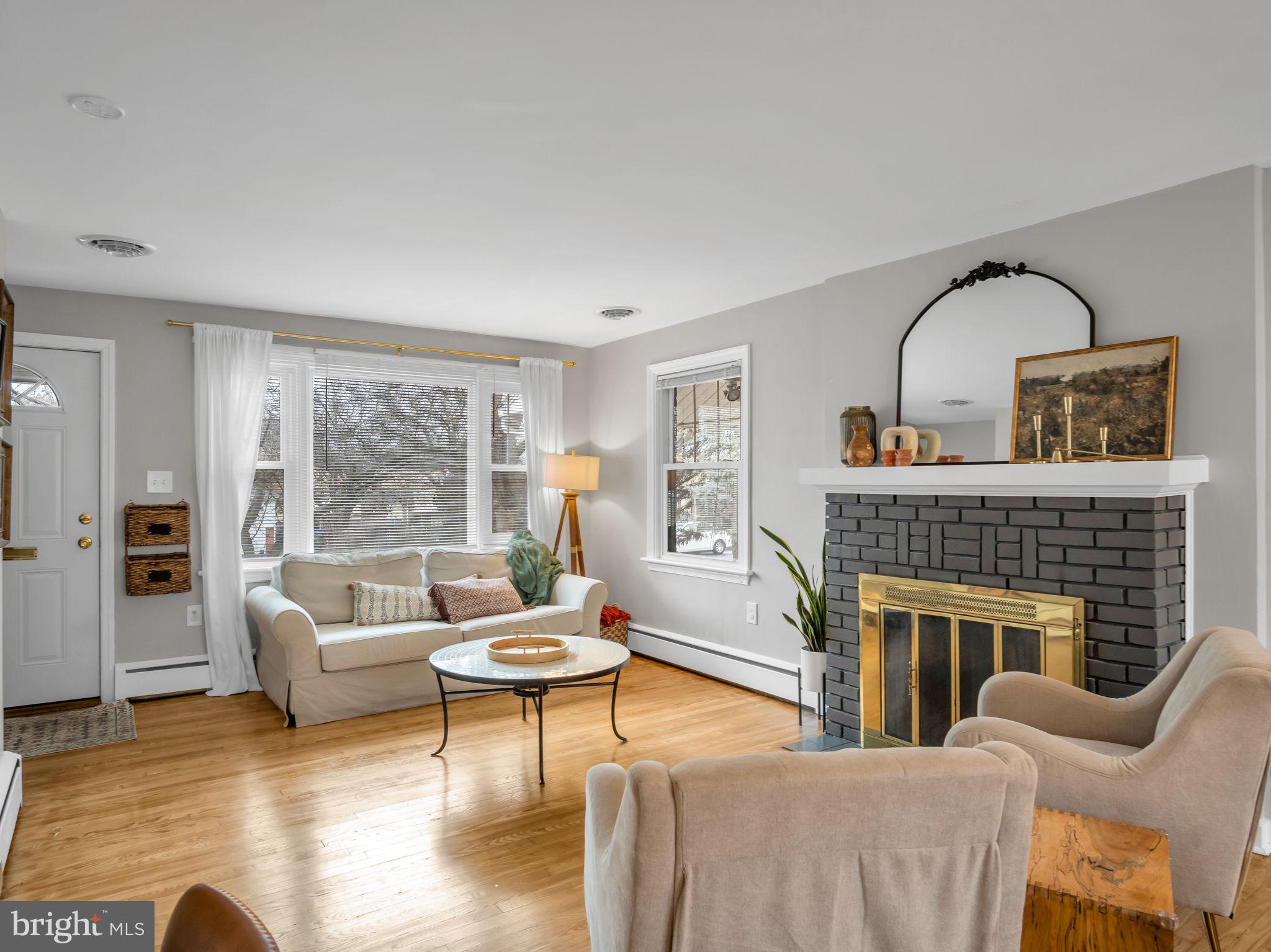 3500 Centerfield Road Harrisburg, PA 17109 - Photo 3 of 32 a living room with furniture fireplace and window