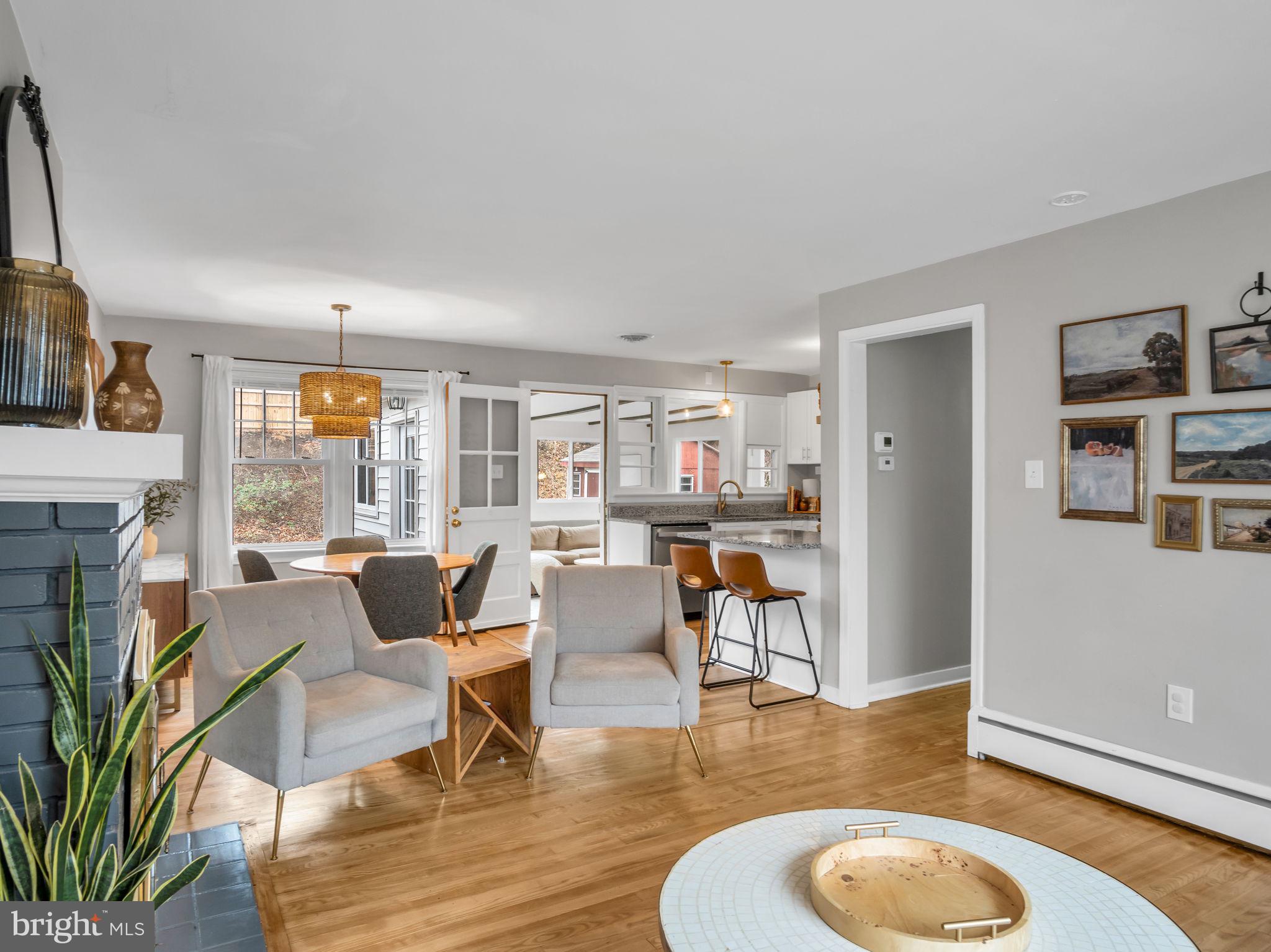 3500 Centerfield Road Harrisburg, PA 17109 - Photo 4 of 32 a living room with fireplace furniture and a wooden floor