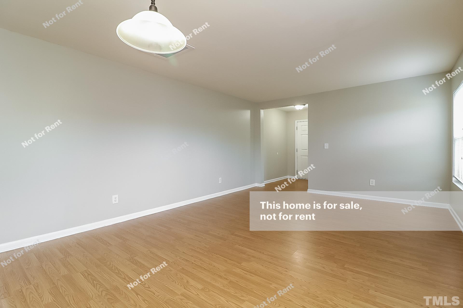 115 Cinder Cross Way Garner, NC 27529 - Photo 11 of 27 a view of a room with gym equipment