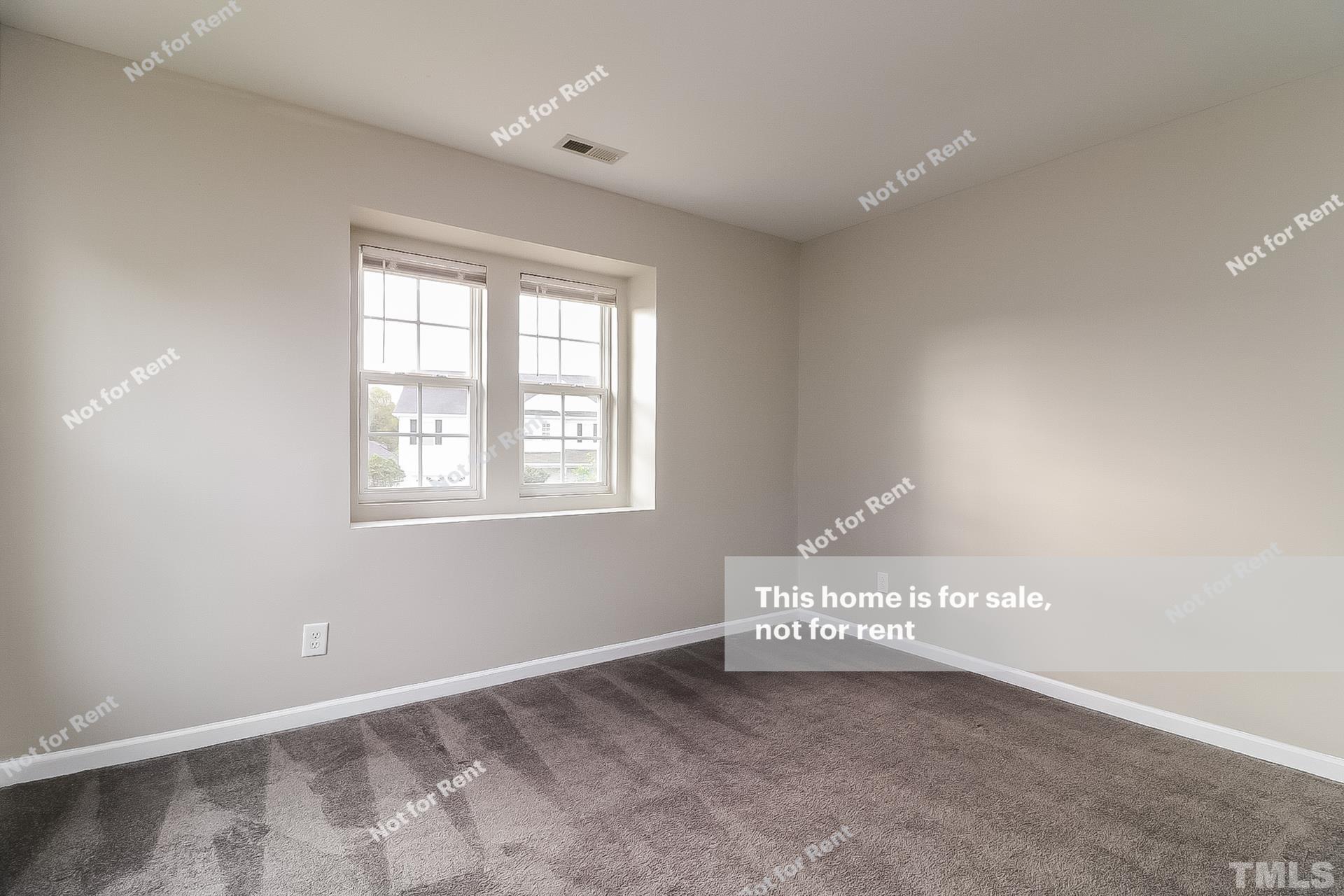 115 Cinder Cross Way Garner, NC 27529 - Photo 17 of 27 a view of a room with window