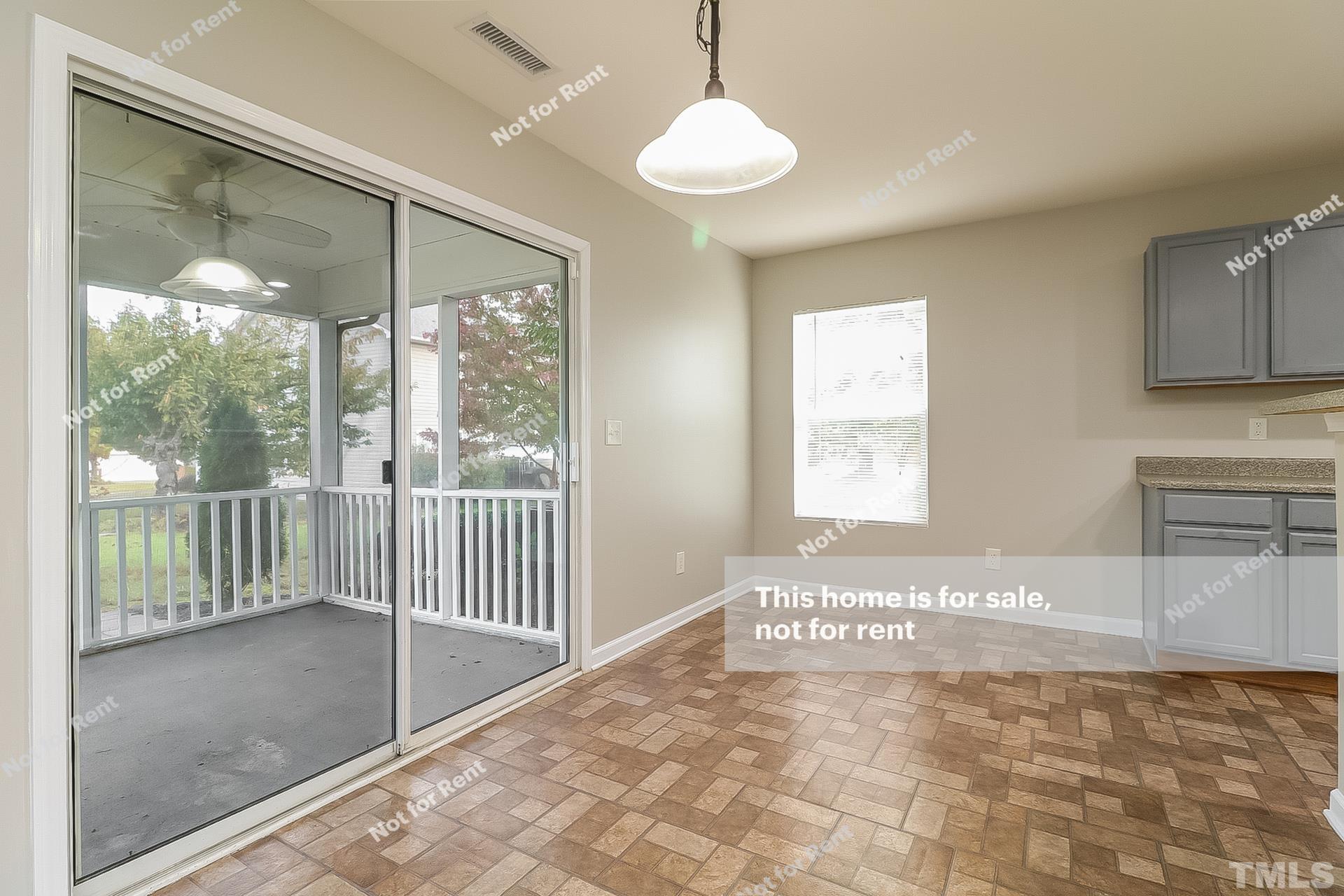 115 Cinder Cross Way Garner, NC 27529 - Photo 23 of 27 a view of a room with a large window