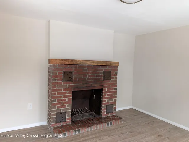 a room with a fireplace