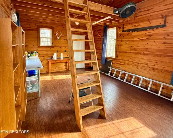 a view of a backyard of the house