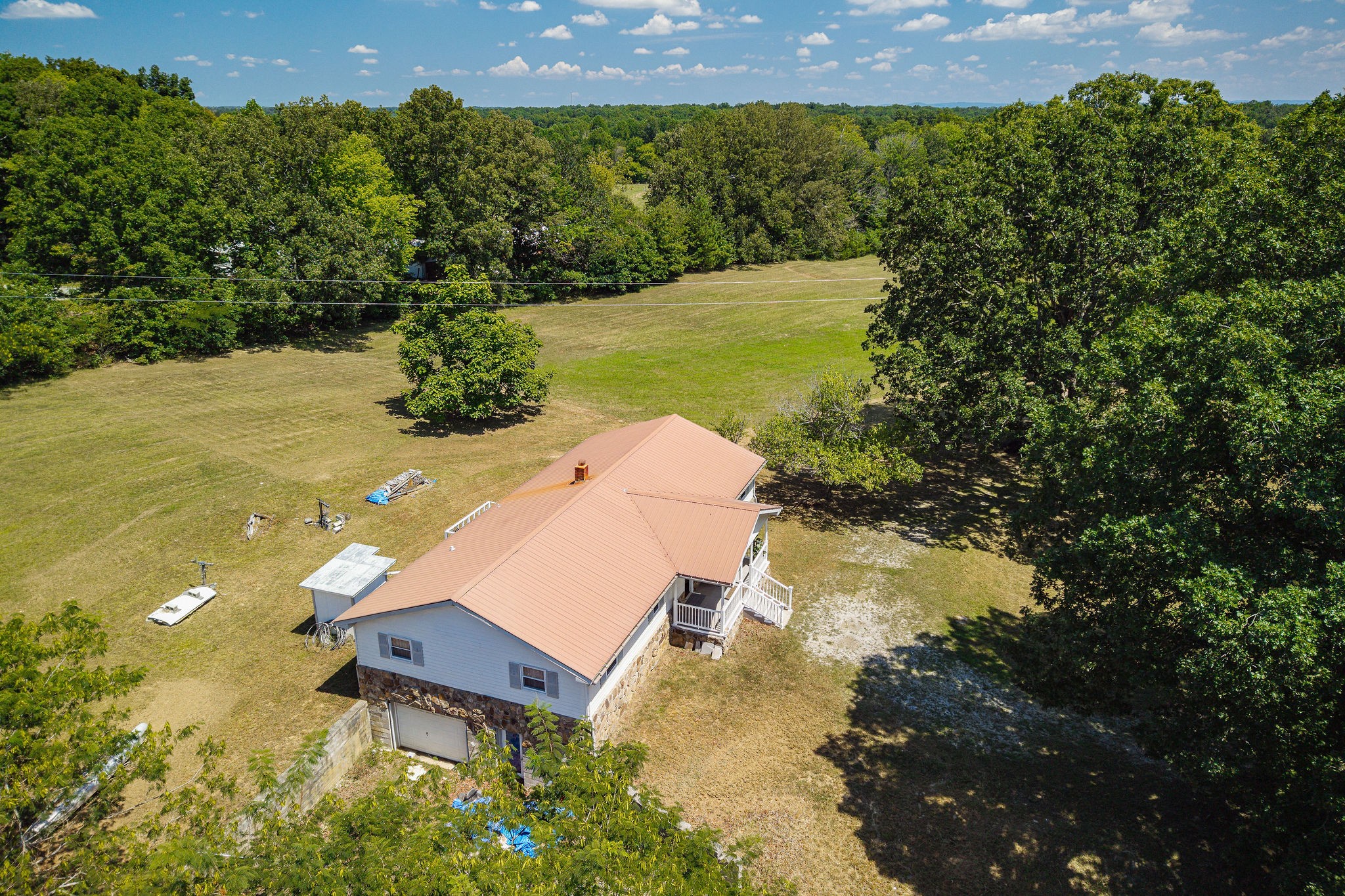 4121 Old Moss Road Baxter, TN 38544 - Photo 3 of 12 a view of a lake from a yard