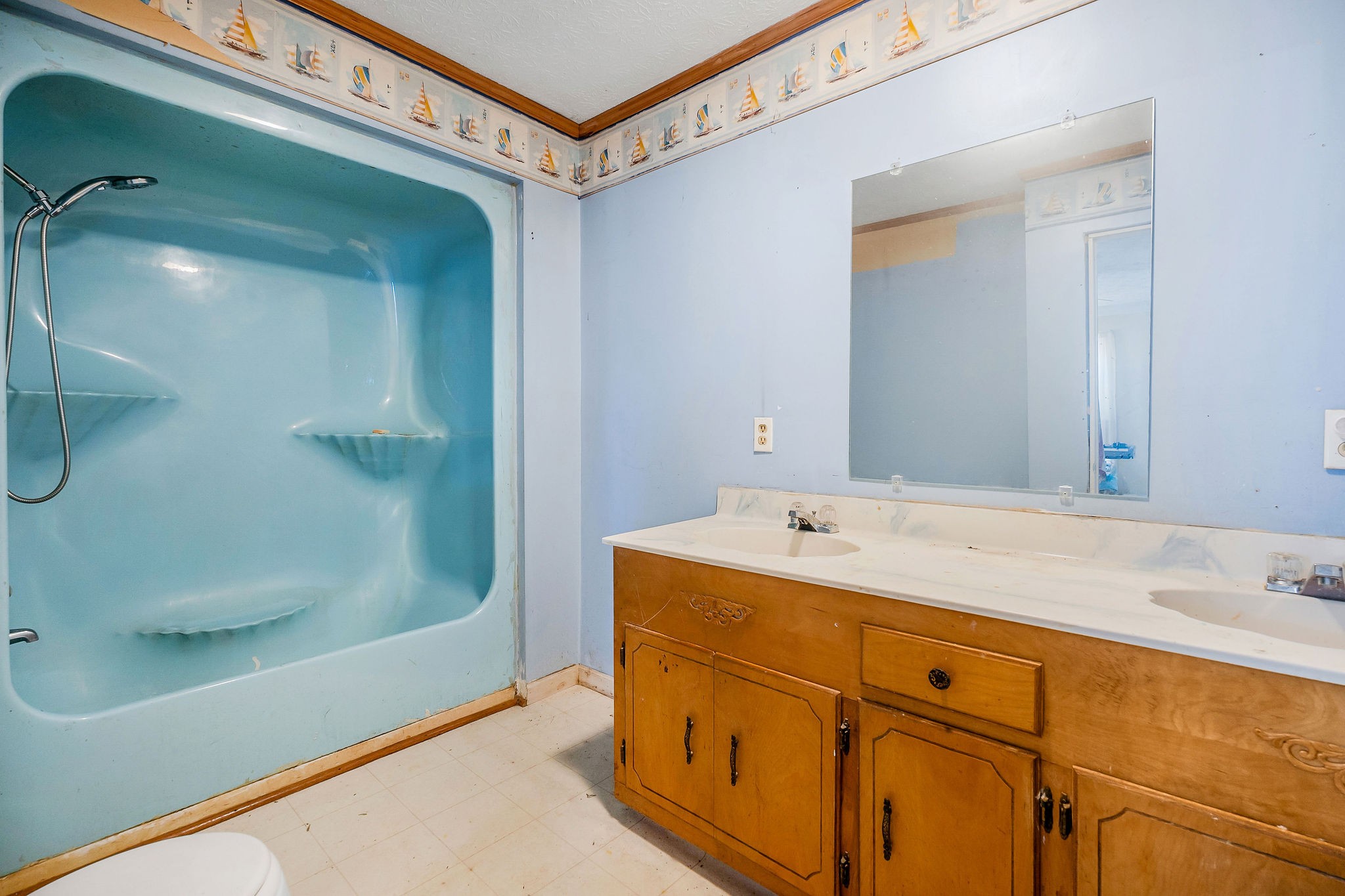 4121 Old Moss Road Baxter, TN 38544 - Photo 8 of 12 a bathroom with a sink and a mirror