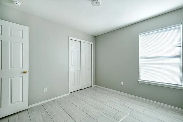 an empty room with windows