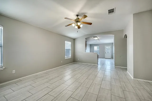 a view of livingroom with hardwood floor and ceiling fan