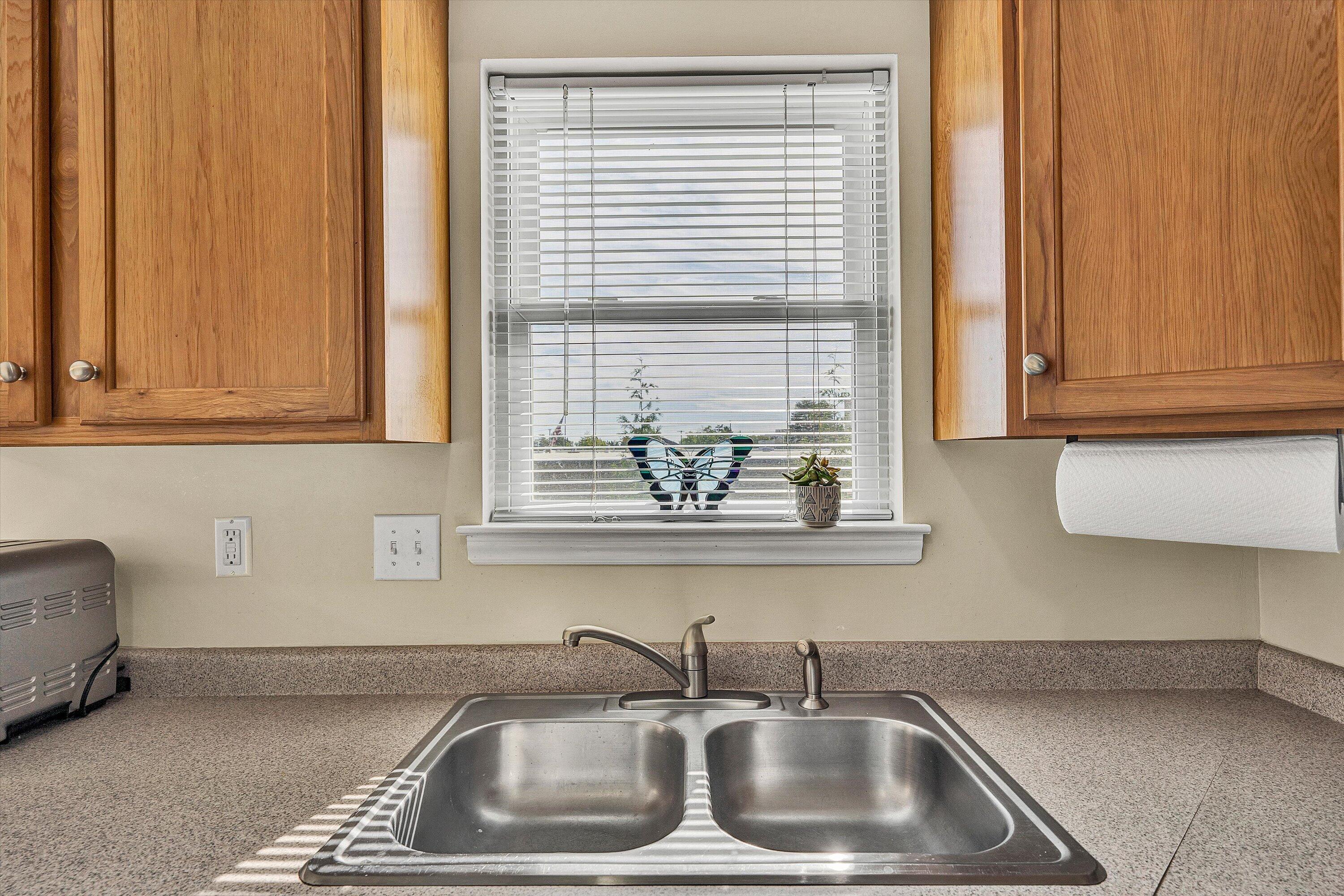 1913 South Clearing Road Salem, VA 24153 - Photo 13 of 28 a kitchen with a sink and a window