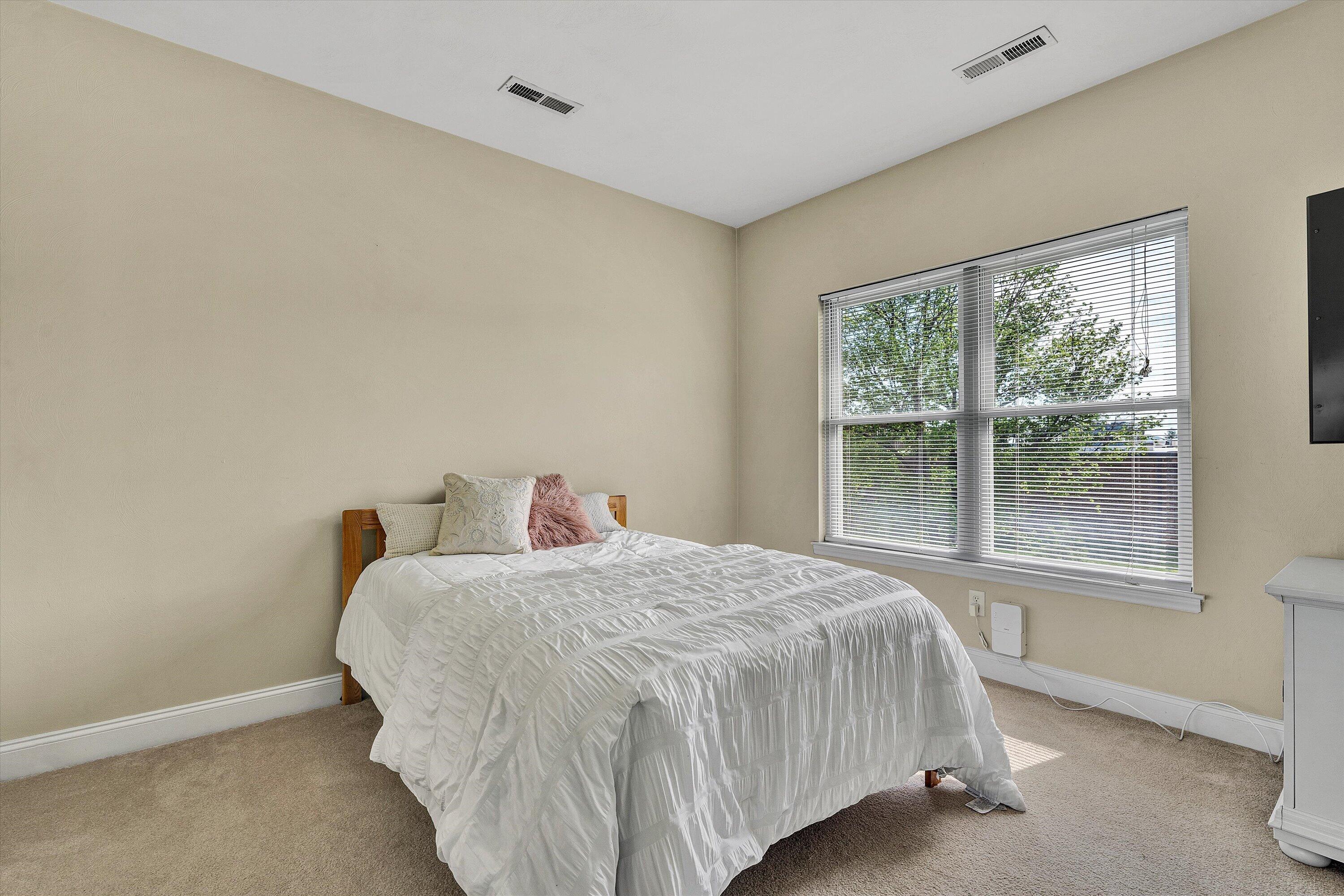 1913 South Clearing Road Salem, VA 24153 - Photo 18 of 28 a bedroom with a bed and a window