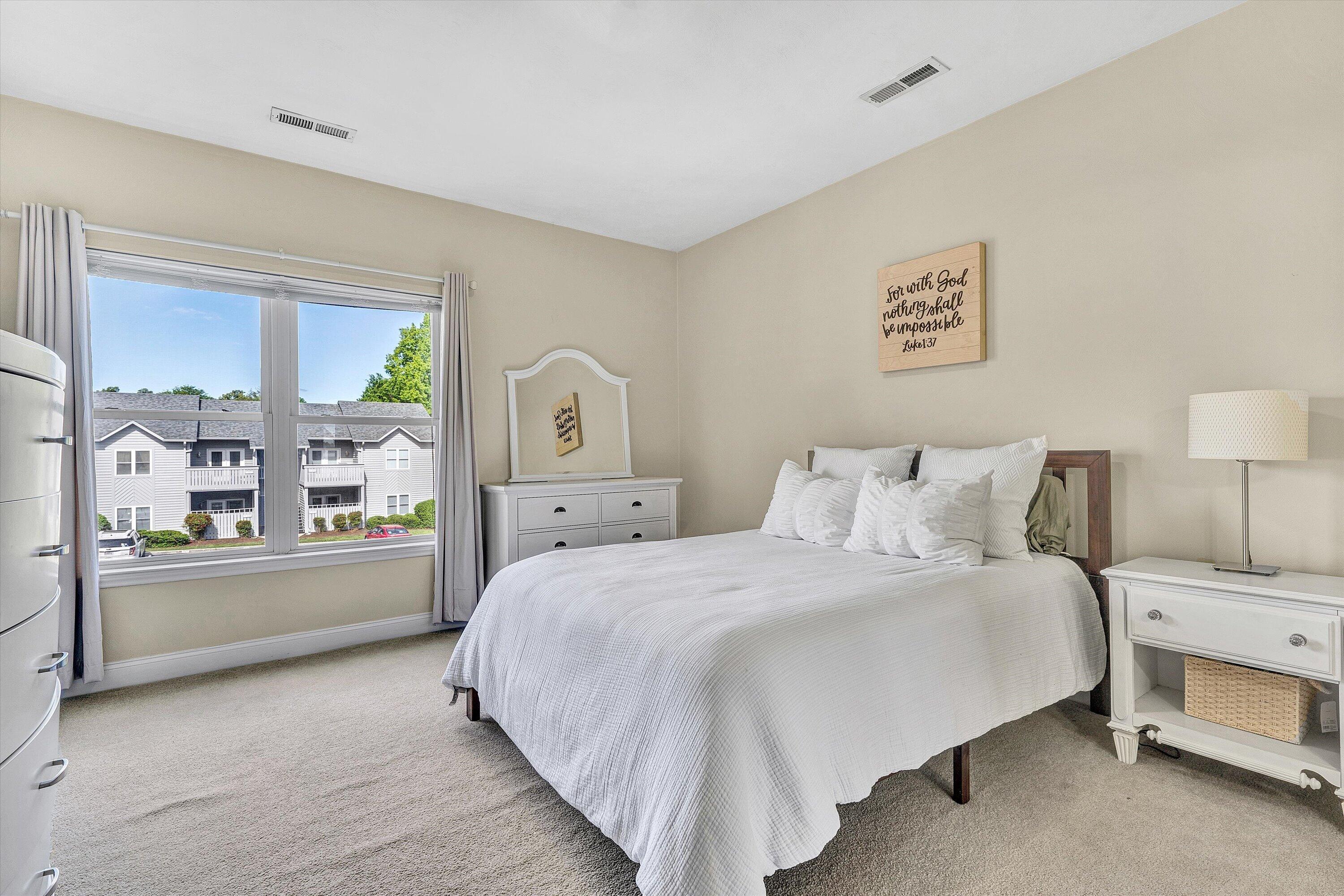 1913 South Clearing Road Salem, VA 24153 - Photo 22 of 28 a bedroom with bed and a large window