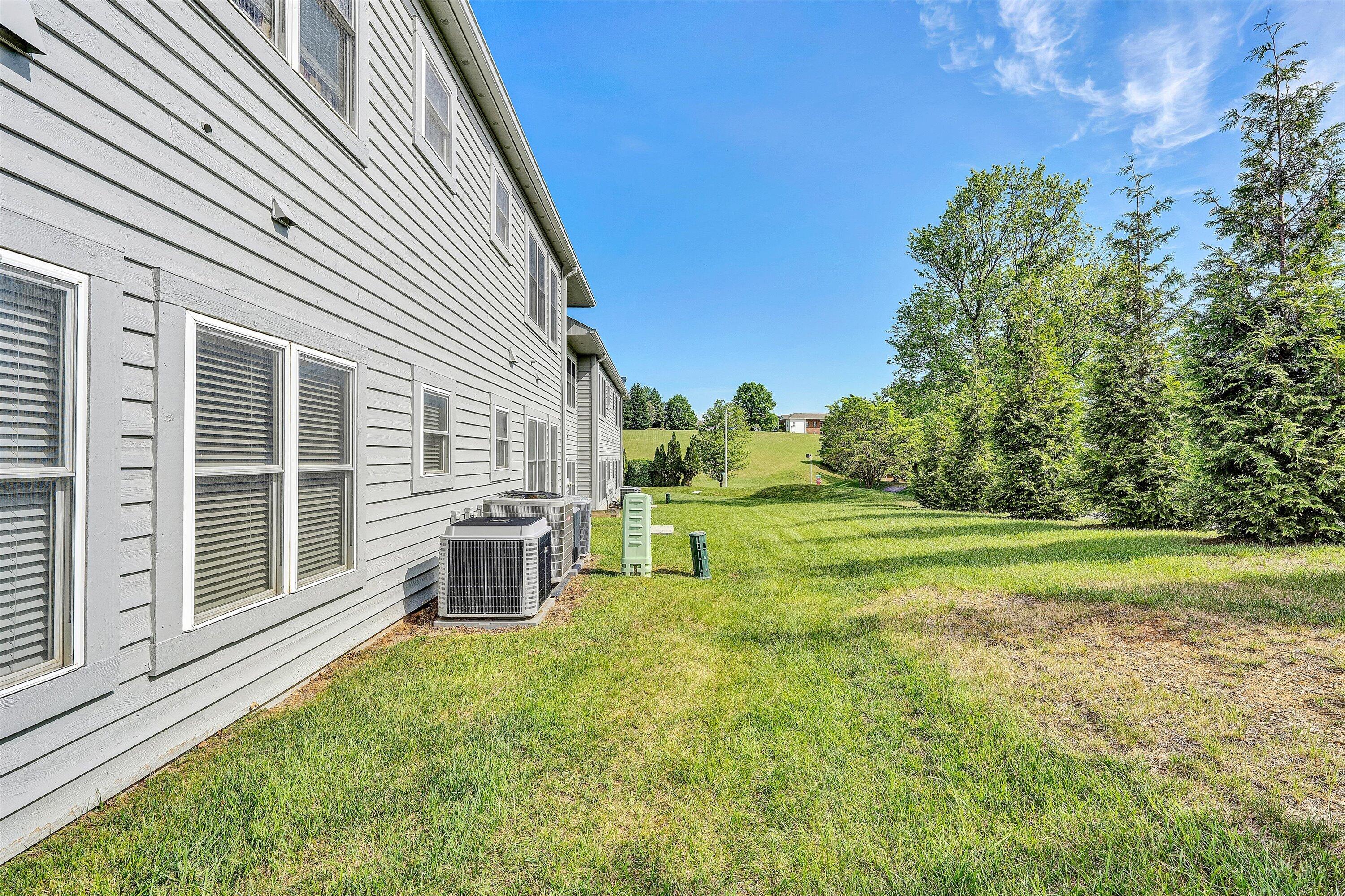 1913 South Clearing Road Salem, VA 24153 - Photo 23 of 28 a view of a house with backyard and a garden