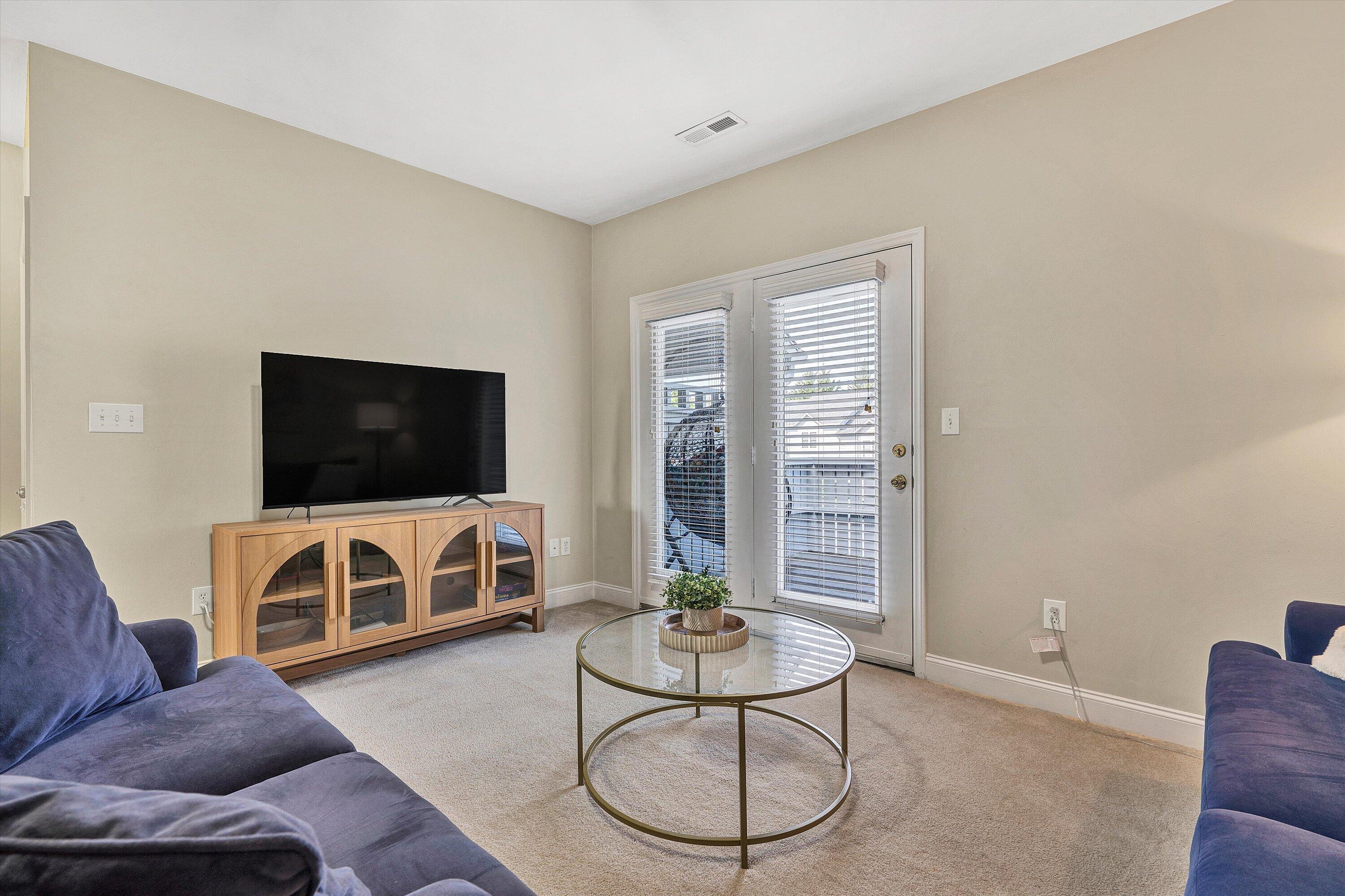 1913 South Clearing Road Salem, VA 24153 - Photo 6 of 28 a living room with furniture and a flat screen tv