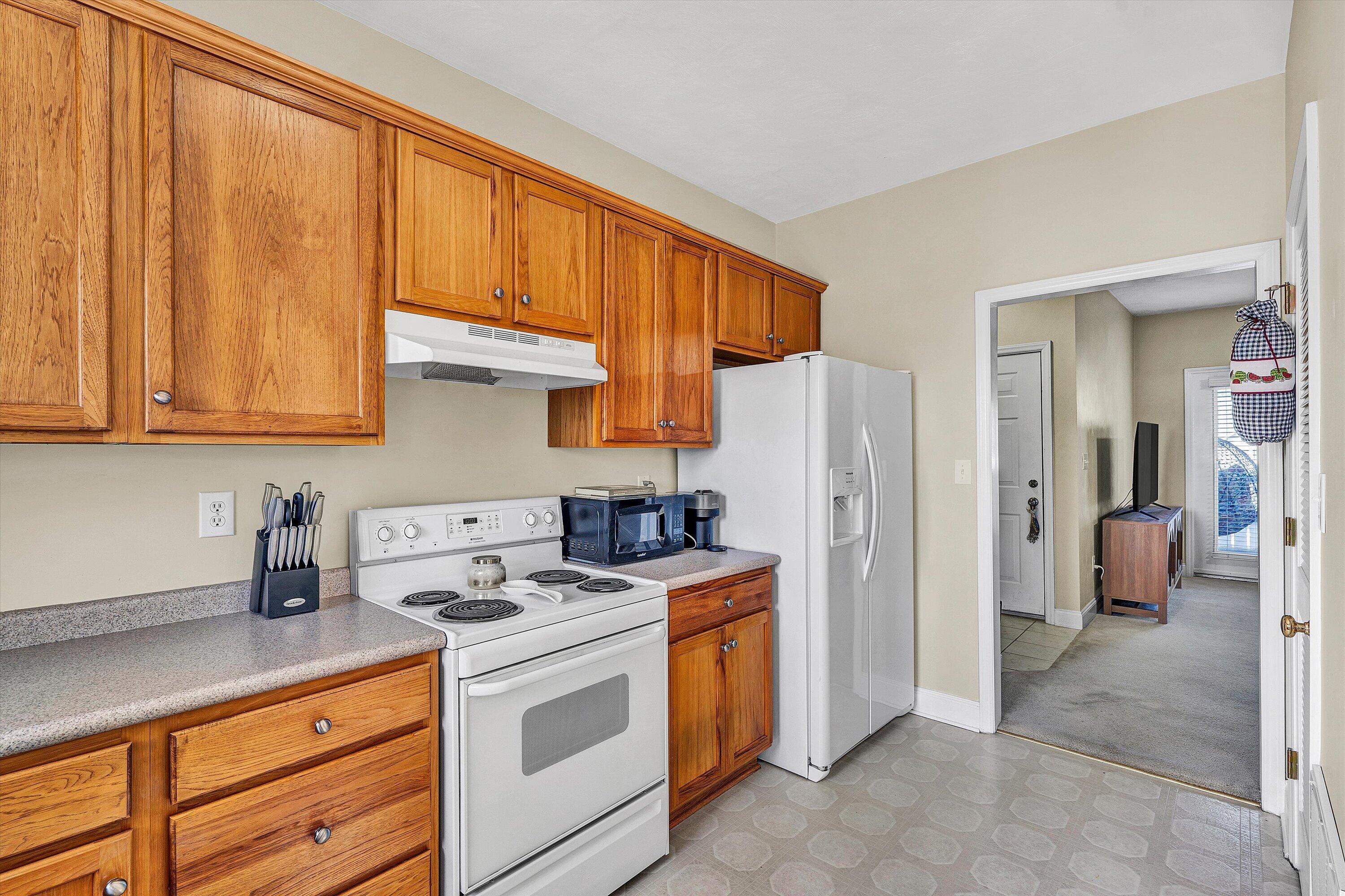 1913 South Clearing Road Salem, VA 24153 - Photo 7 of 28 a kitchen with stainless steel appliances granite countertop a refrigerator stove and sink