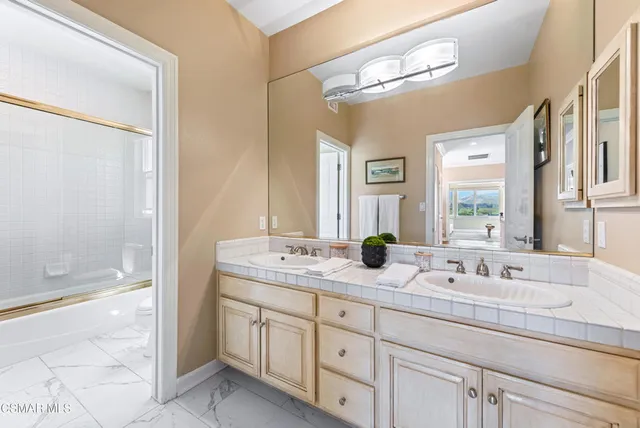 a view of a balcony with lake view and mountain view