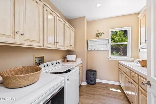 a view of a patio with wooden floor