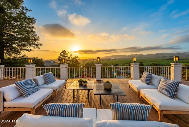 a view of a swimming pool with a lounge chairs