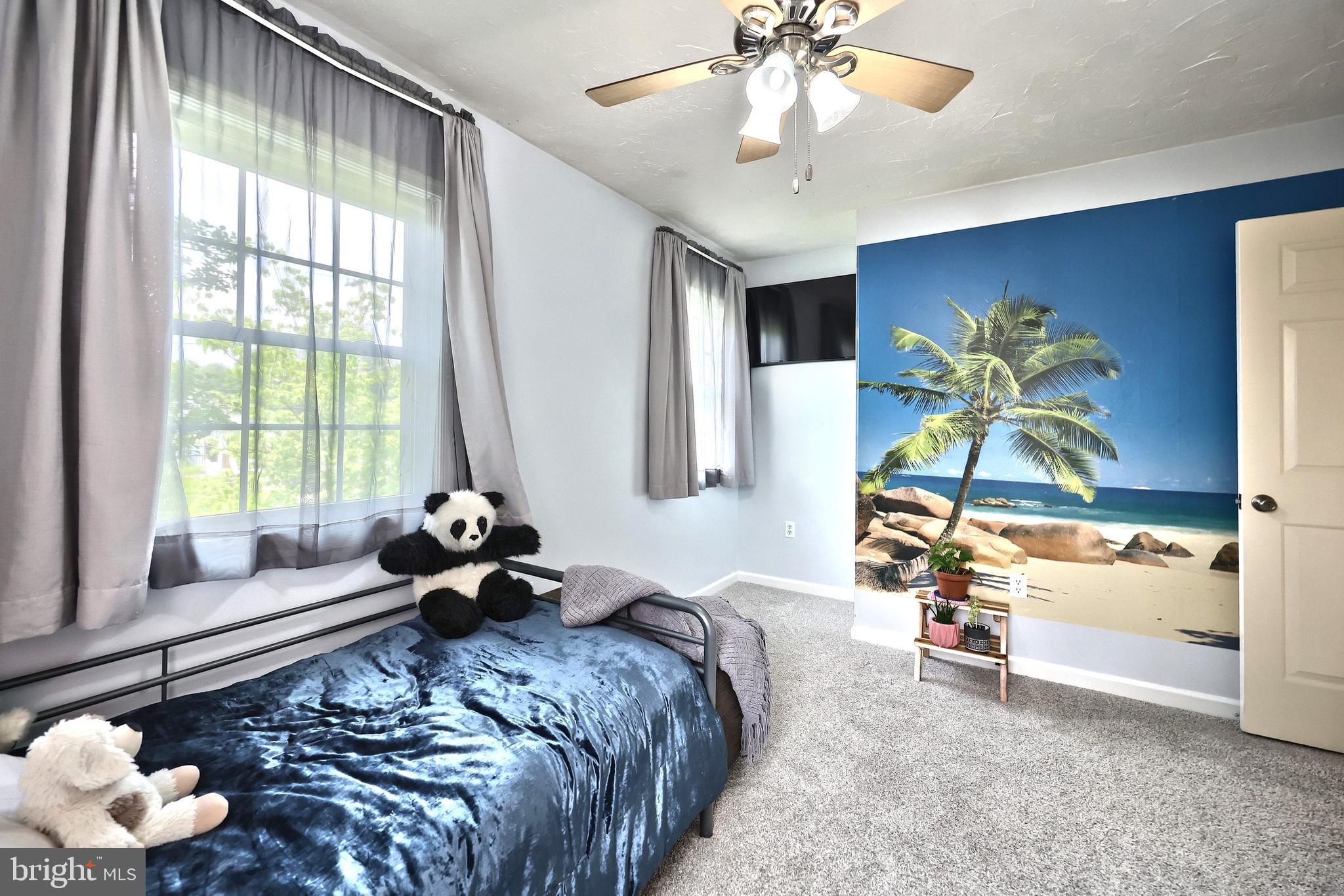 3604 Centennial Road Hanover, PA 17331 - Photo 26 of 48 a spacious bedroom with a bed and a chandelier