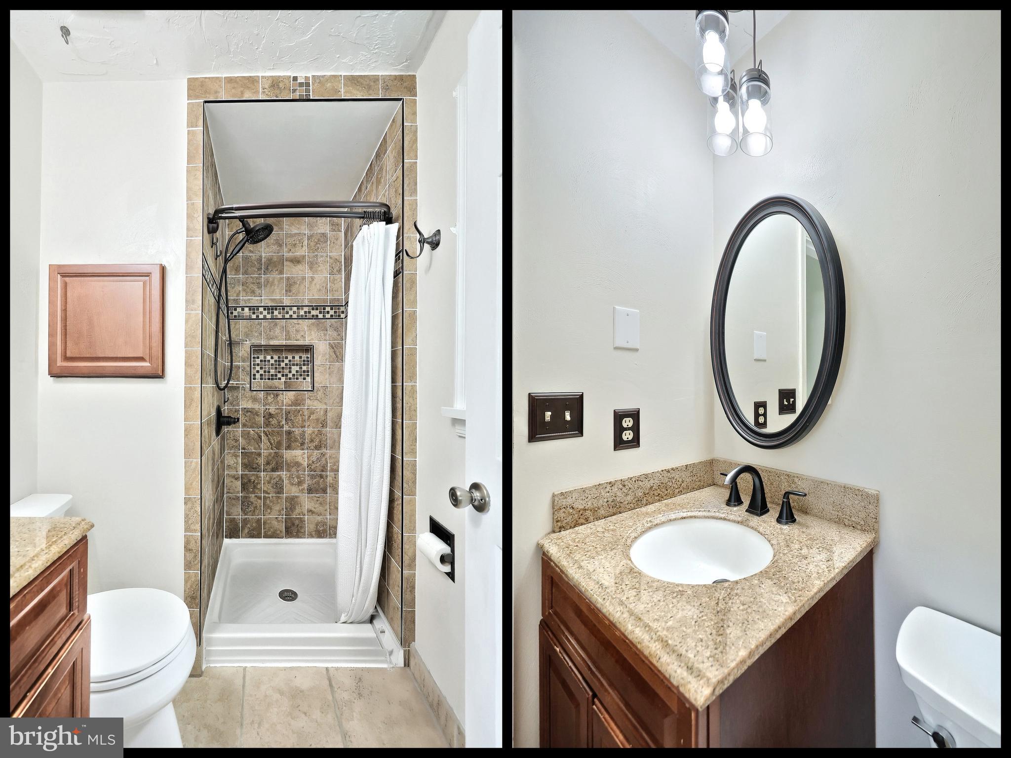 3604 Centennial Road Hanover, PA 17331 - Photo 31 of 48 a bathroom with a granite countertop sink toilet a mirror and shower