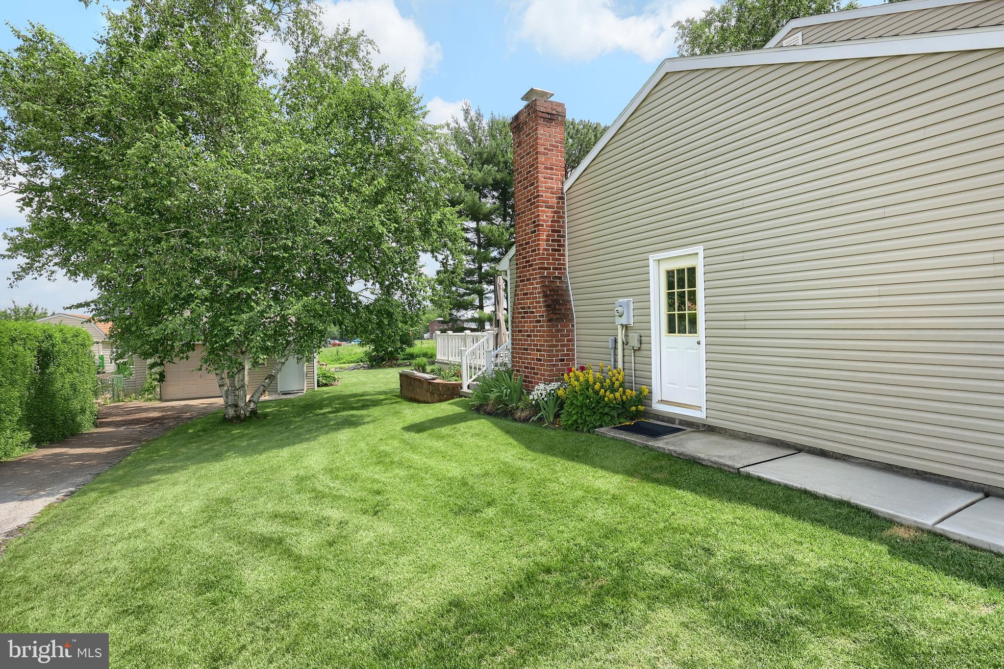 3604 Centennial Road Hanover, PA 17331 - Photo 5 of 48 a view of a backyard with a garden