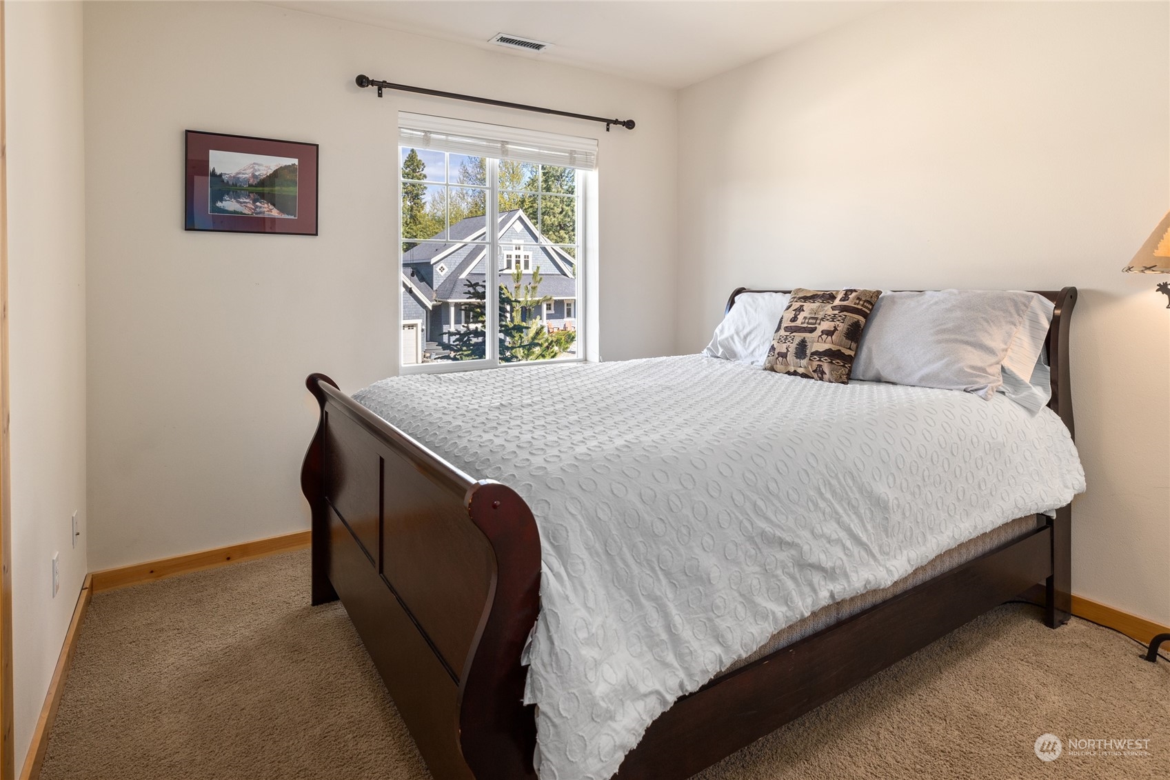 50 Raintree Lane, Unit 4 Ronald, WA 98940 - Photo 15 of 28 a bedroom with a bed and a window