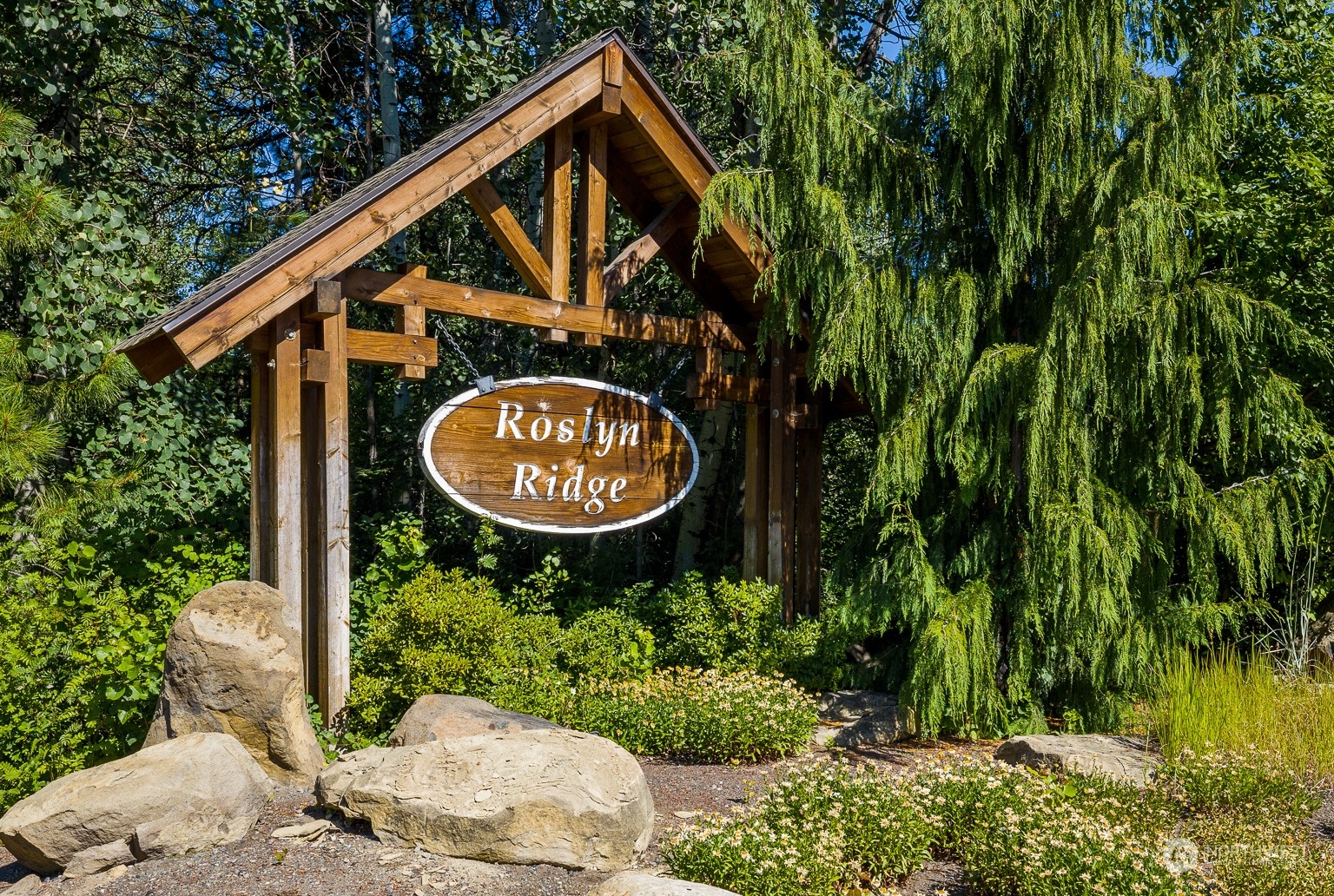 50 Raintree Lane, Unit 4 Ronald, WA 98940 - Photo 23 of 28 a view of a backyard with plants and a fountain