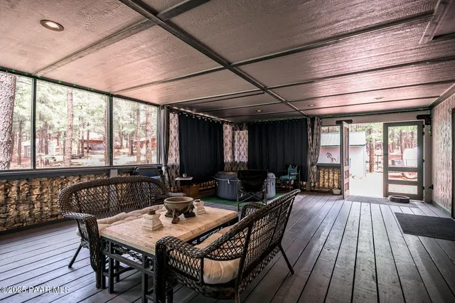 a view of a house with a yard and garage
