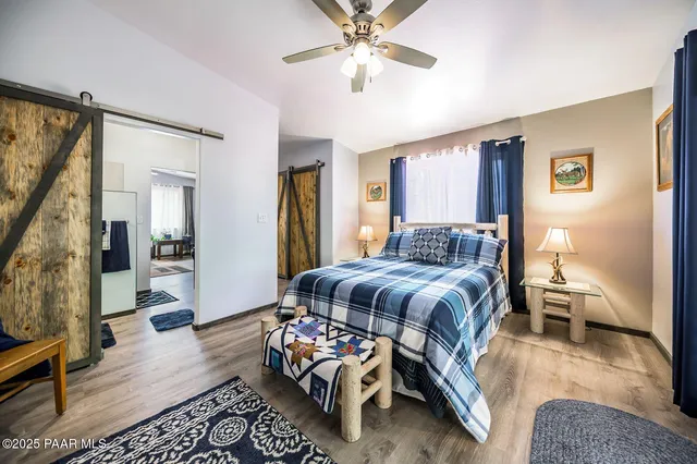 a bed room with a bed and a couch