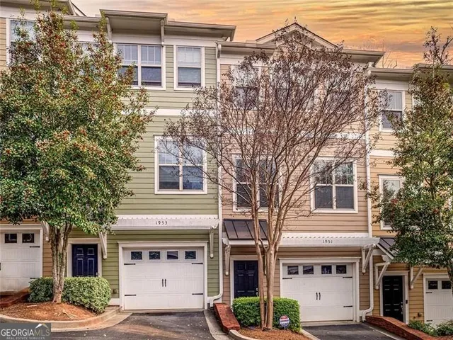 a front view of a building with street view