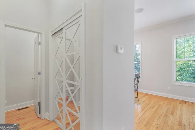 a bathroom with a sink a mirror and vanity