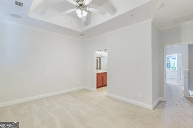 a bathroom with a double vanity sink mirror and bathtub