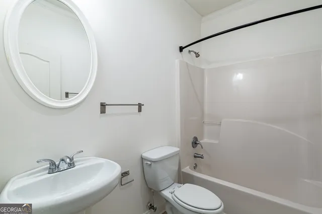 a view of balcony with wooden floor and fence