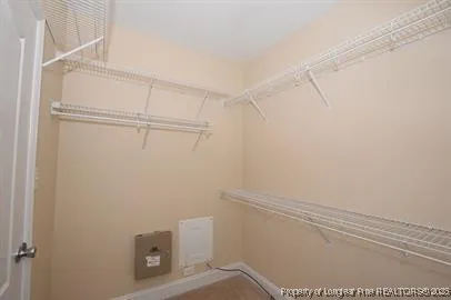 a view of small space with racks on the wall