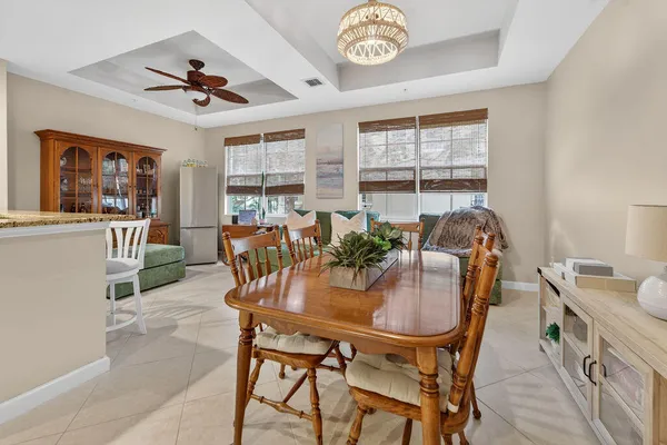 a view of a dining room with furniture window and outside view